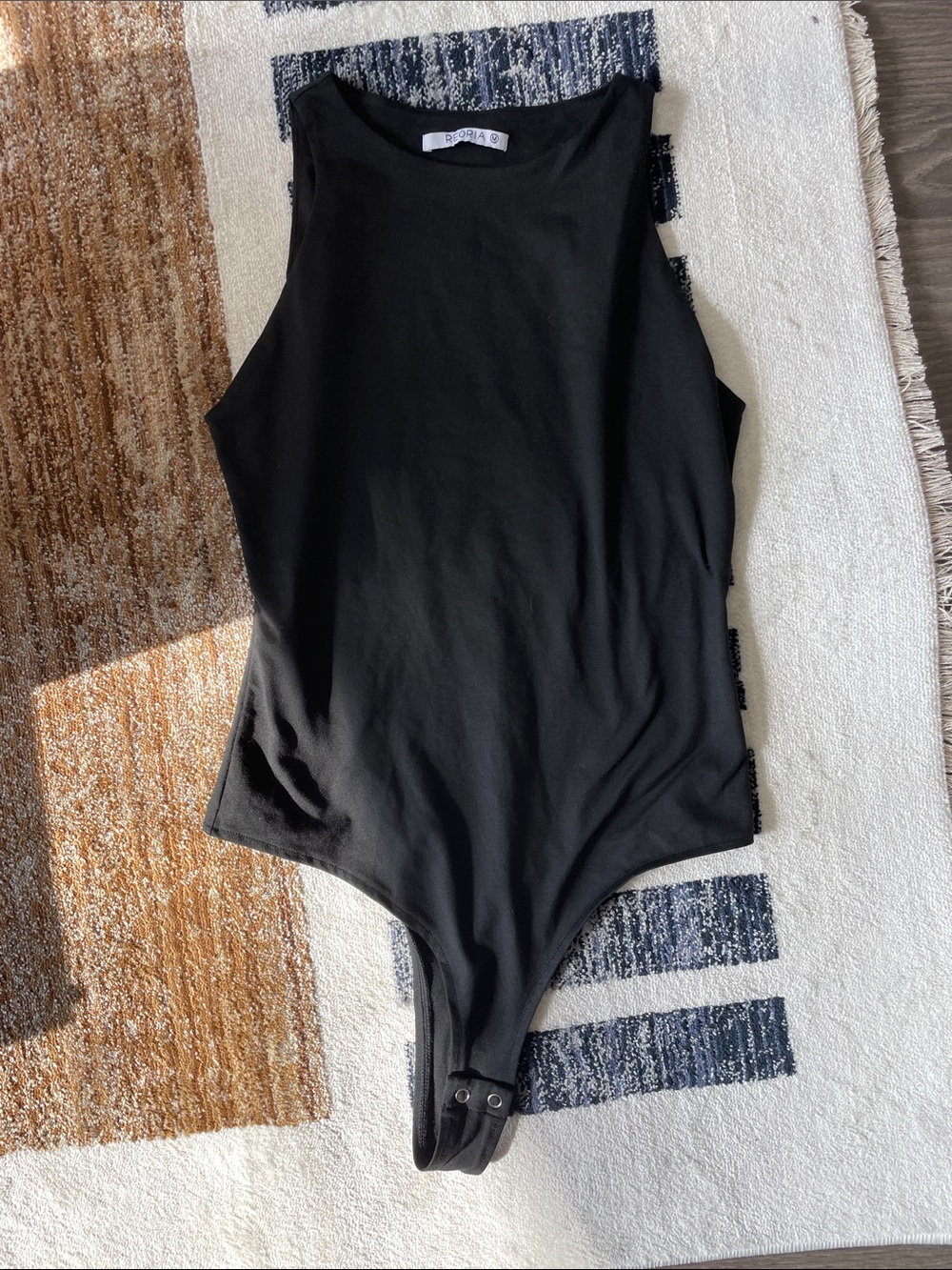 Never worn ReoRia Black Sleeveless Bodysuit